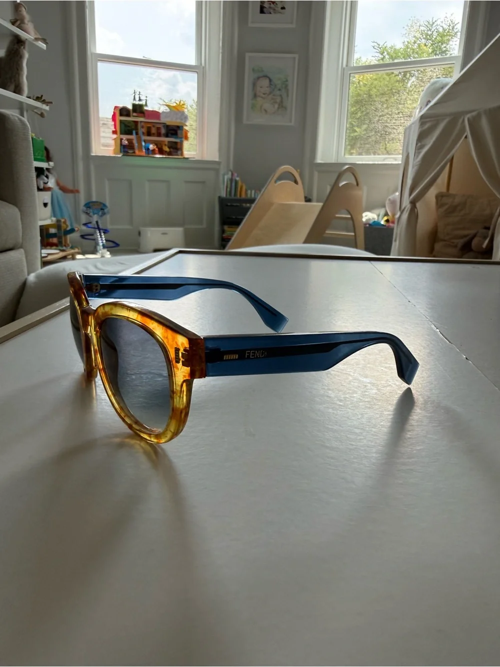Fendi Tortoiseshell Round Sunglasses with Amber Frame and Gradient Lenses